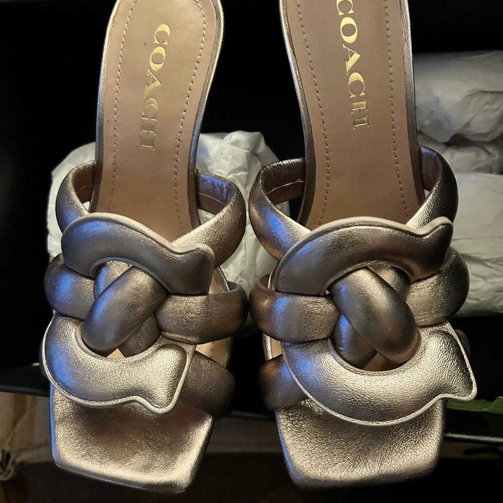 Brand new in box Coach platinum champagne Heeled Mules with Knotted C Detail